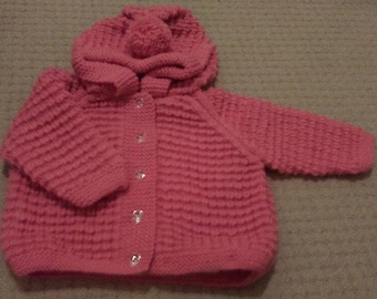 Peach hooded jacket with pompom