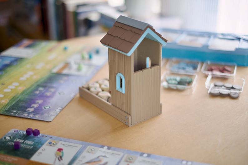 Rear view of a Wingspan board game dice tower