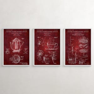 May include: Three vintage red patent prints for a teapot, teacup, and tea infuser. The prints are in white and feature detailed illustrations of each item. The text on the prints reads "United States Patent Office".