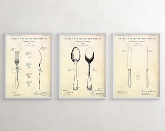 May include: Three vintage United States Patent Office prints featuring black and white illustrations of a fork, two spoons, a knife, and a spoon. The prints are framed in white and have a cream background.