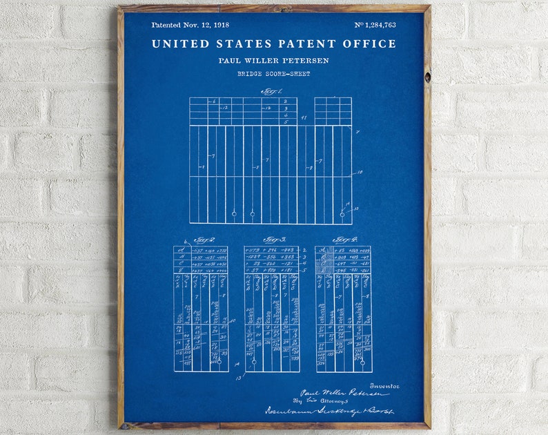 May include: A blue and white blueprint for a bridge score sheet patent, dated November 12, 1918, with the patent number 1,284,763. The patent is for a bridge score sheet, and the blueprint shows the layout of the score sheet and the different ways that it can be used.