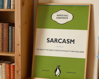 May include: A framed rectangular print featuring a green and cream background with the text SPECIAL EDITION at the top, the word SARCASM in the center, and the definition THE ABILITY TO INSULT IDIOTS WITHOUT THEM REALISING below, with a penguin icon.