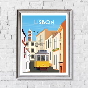 May include: A yellow vintage tram travels down a narrow street in Lisbon, Portugal. The street is lined with colorful buildings and the tram is surrounded by a blue sky.