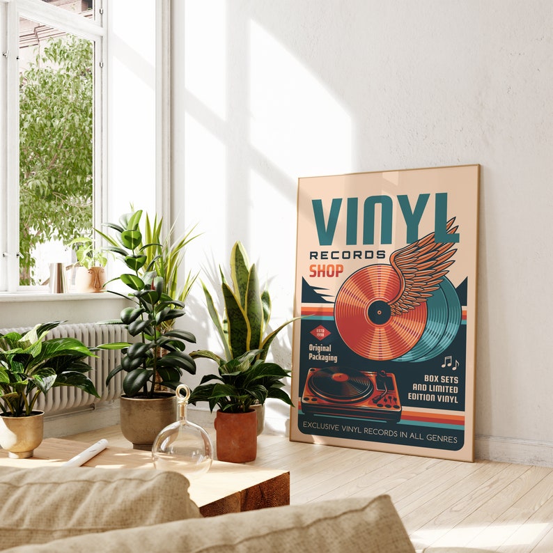 May include: A vintage-style poster advertising a vinyl record shop. The poster features a red and orange vinyl record with a stylized wing design. The text on the poster reads "Vinyl Records Shop", "Original Packaging", "Box Sets and Limited Edition Vinyl", and "Exclusive Vinyl Records in All Genres".