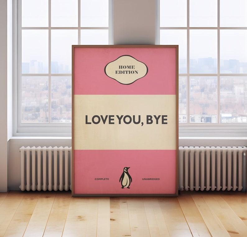 May include: A pink and cream poster with a penguin illustration and the text "HOME EDITION LOVE YOU, BYE COMPLETE UNABRIDGED".
