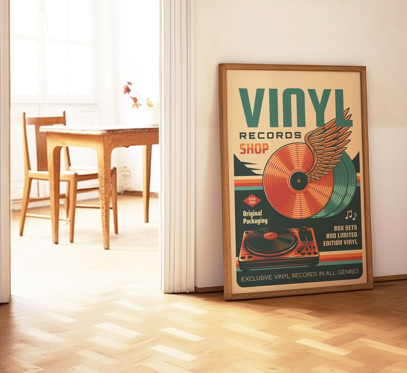 May include: A vintage-style poster advertising a vinyl record shop. The poster features a colorful illustration of a record player, a record, and a winged design. The text on the poster reads "Vinyl Records Shop", "Original Packaging", "Box Sets and Limited Edition Vinyl", and "Exclusive Vinyl Records in All Genres".