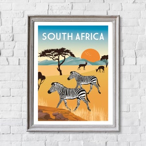 May include: A vintage travel poster with a sunset scene featuring zebras and antelopes in a savanna landscape. The poster has the text "SOUTH AFRICA" in white letters on a blue background.