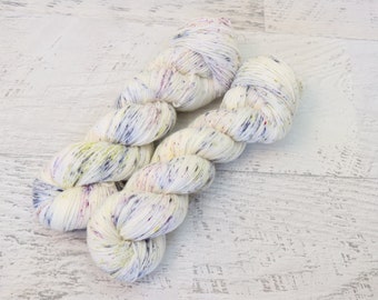 Speckled Fingering Weight Sock Yarn (75/25 Superwash Merino/ Nylon) Hand Dyed in Purple, Green,&Blue Speckles on white 100 g - B