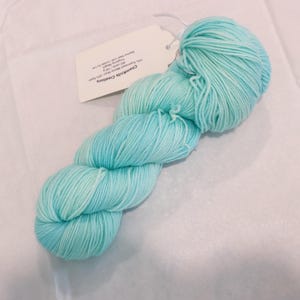 Pale Blue Tonal Fingering Weight Sock Yarn (75/25 Superwash Merino/ Nylon)hand dyed in a light/medium blue - 100 g