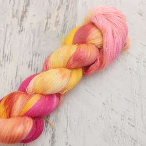 Variegated Lace Weight Yarn (70/30 Alpaca/Silk) Hand Dyed in yellow, pinks, and orange - 100 g