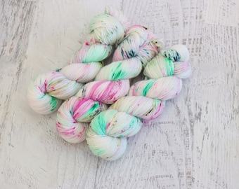 Speckled Fingering Weight Sock Yarn (75/25 Superwash Merino/ Nylon) hand dyed in with Green and Pink Speckles on White and Pastels - 100 g