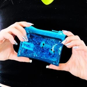 Monedero con purpurina Goo - Ataque a Marte - Azul - Monedero de gelatina - Monedero extraterrestre - Monedero azul - Monedero de plástico - Extraterrestre - Monedero luminoso