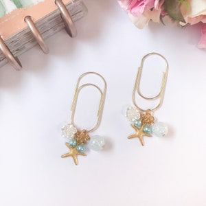 Planer Accessoires, Planer Zubehör, große Büroklammer mit Seestern, weiße Blume und aqua Kristalle