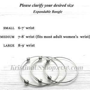 May include: Three expandable silver bangles in different sizes. The sizes are labeled as small, medium, and large. The small bangle is 6-7 inches, the medium bangle is 7-8 inches, and the large bangle is 8-9 inches.
