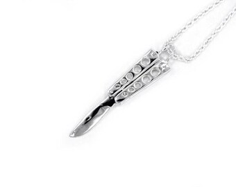 Butterfly knife necklace deals