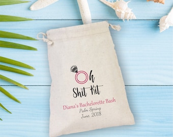 May include: A white drawstring bag with the text "Oh Shit Kit" printed on it. The bag also includes the text "Diana's Bachelorette Bash, Palm Springs, June 2018".
