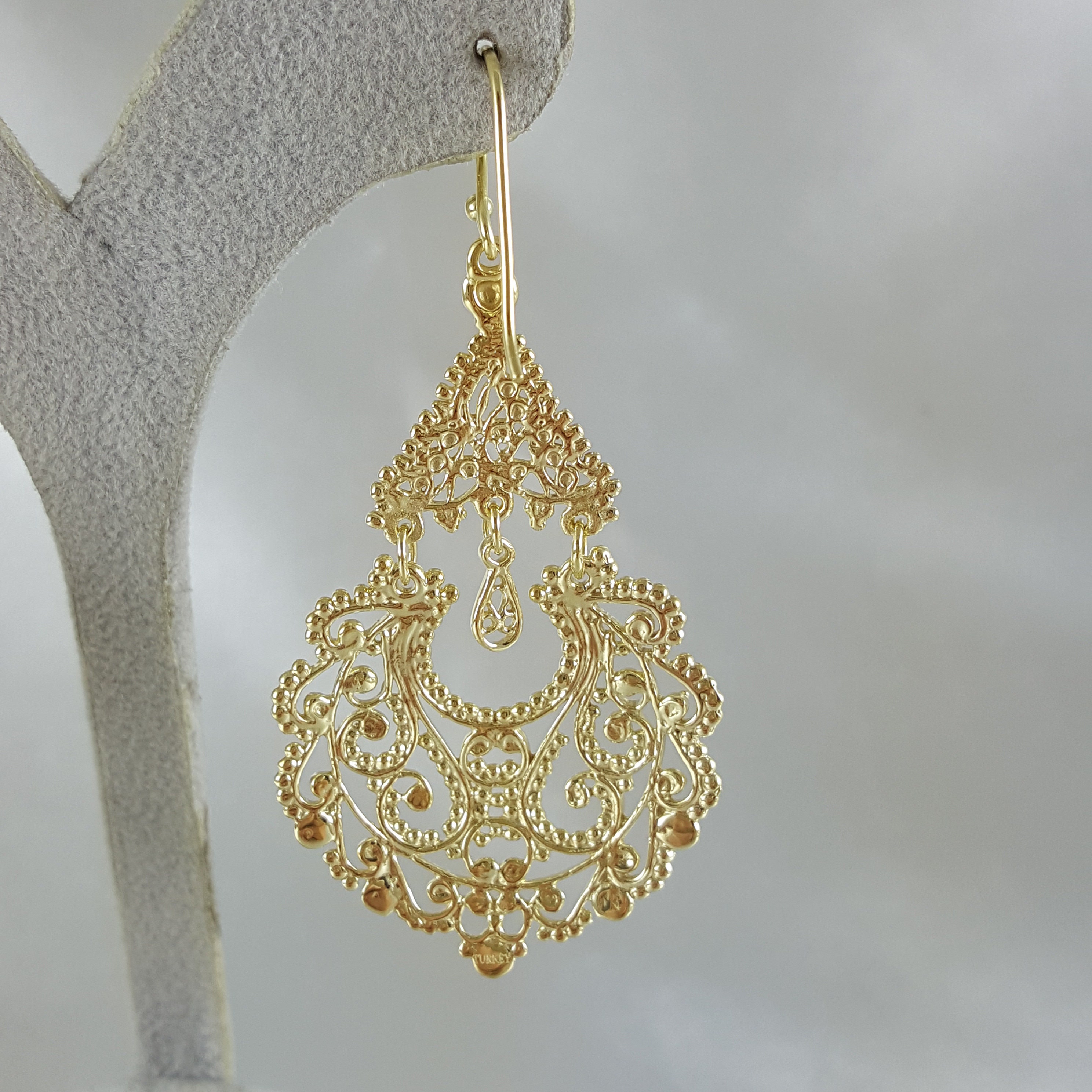 Gold earrings shop chandelier