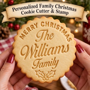 May include: A round, scalloped-edge cookie featuring the embossed text Merry Christmas, The Williams Family, and a holly leaf design. Above the cookie, a beige banner displays the text Personalized Family Christmas Cookie Cutter & Stamp.