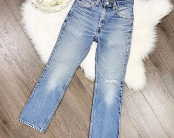 Levi's Vintage 517 de talla 26/27, lavado medio, corte ajustado, bota acampanada.