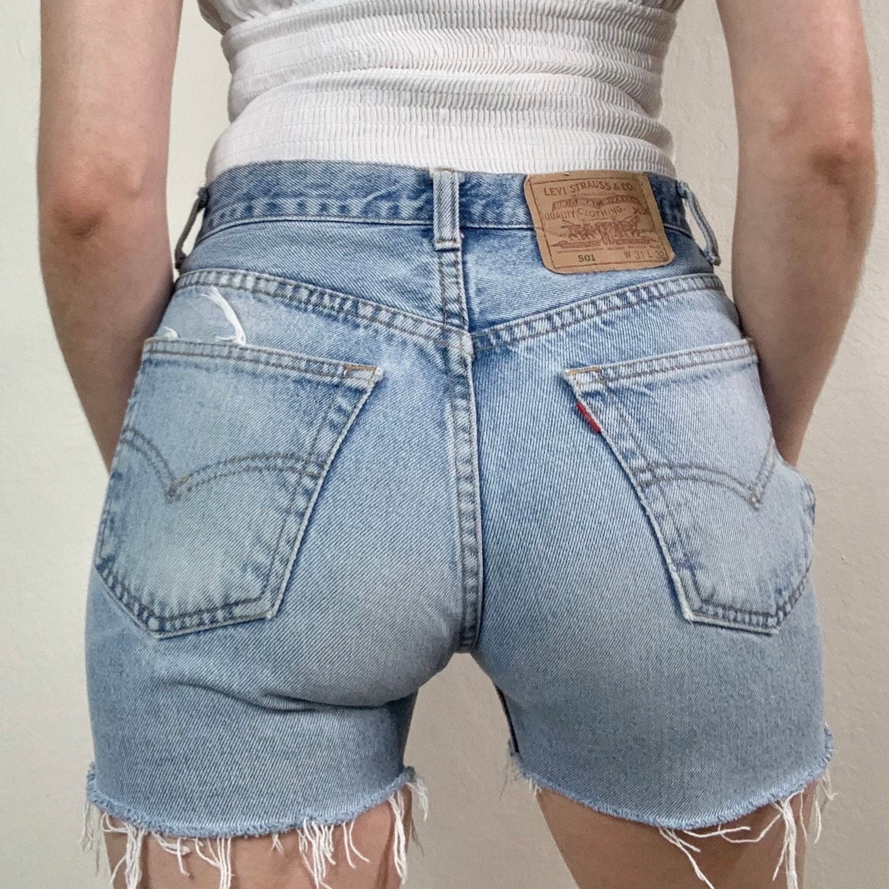 501 light wash distressed denim cutoff shorts 2025