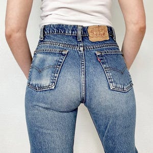 Maat 27/28 Vintage jaren 80 505 medium wash oranje tab slim-fit rechte pijpen Levis