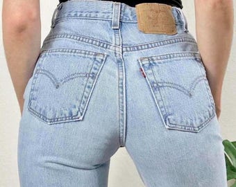 Levi's Vintage 512 de talle alto, corte ajustado, lavado claro, talla 27