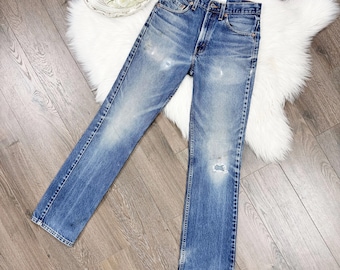 Taille 26 vintage 517 effet vieilli moyen, coupe ajustée, jambe évasée Levis Levis