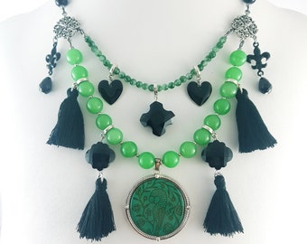 Limited Edition tassel necklace with apple-green adventurine and jade gemstones, glass, and Celtic bird pendant..