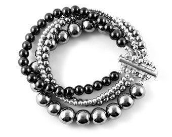 Four-strand cuff bracelet made of non-magnetic hematite beads.