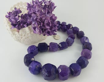 Faceted purple agate gemstone necklace.