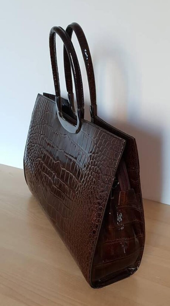 Snake-skin handbag