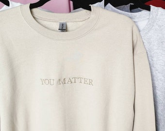 Geestelijke gezondheidsbewustzijn zwart-wit geborduurd sweatshirt met ronde hals