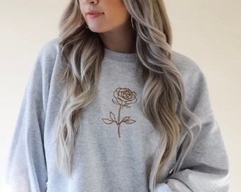 Geboortemaand bloem geborduurd sweatshirt met ronde hals