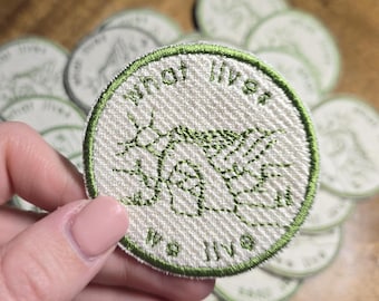 Moabs delicate boog 'What Lives We Live' opstrijkpatch