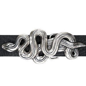 May include: A silver snake belt buckle with a detailed design. The buckle is attached to a black leather belt.