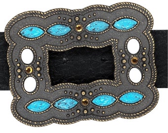 May include: A silver-toned belt buckle with a rectangular frame and ornate details. The buckle is decorated with turquoise and gold-colored stones.