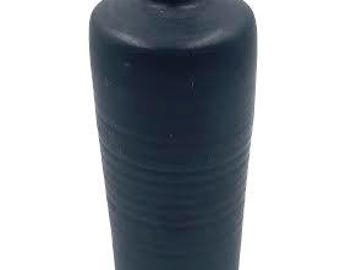 May include: A dark blue ceramic vase with a textured surface. The vase has a narrow neck and a wide base.