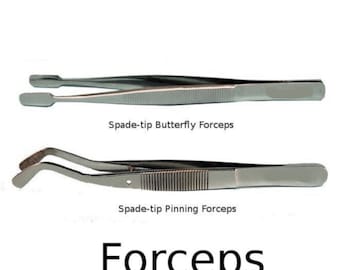 May include: Two stainless steel forceps are displayed against a white background. The top forceps is labeled "Spade-tip Butterfly Forceps" and the bottom one is labeled "Spade-tip Pinning Forceps". The word "Forceps" is written in a large, bold font at the bottom.