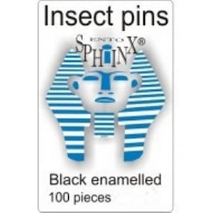 May include: A white rectangular label with the text "Insect pins" at the top. Below is a blue and white graphic of a sphinx. The text "Black enamelled 100 pieces" is at the bottom.