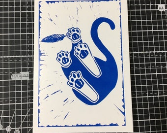 cat from underneath greetings card - from lino print