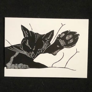 Carte de vœux de chat noir endormi