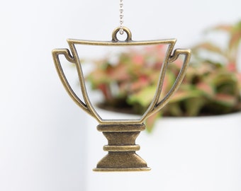 2 Trophy charms antique silver tone P470