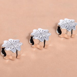 10 pcs - 10 x 10 mm Argenté antique trèfle à quatre feuilles intercalaires (64559-2540)