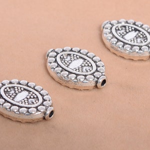 10 Pcs - 19x13MM Antique Silver Tone Oval Spacer Beads (64631-2543)