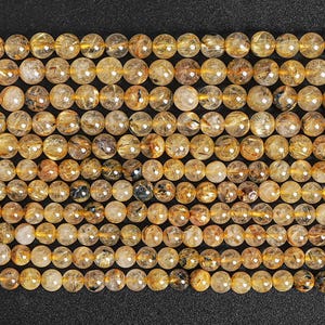 Cuentas de piedra preciosa de cuarzo rutilado natural genuino de 5 mm y 6 mm, redondas y doradas de titanio, de calidad AA (121487)
