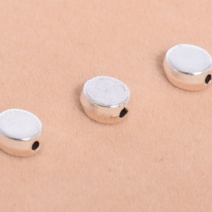 30 Pcs - 6x6MM Antique Silver Tone Oval Spacer Beads (64634-2544)