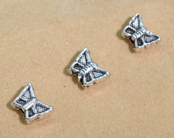 50 Pcs - 7x5MM Antique Silver Tone Butterfly Spacer Beads (63234-2389)