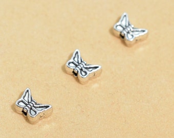 50 Pcs - 7x5MM Antique Silver Tone Butterfly Spacer Beads (63243-2390)