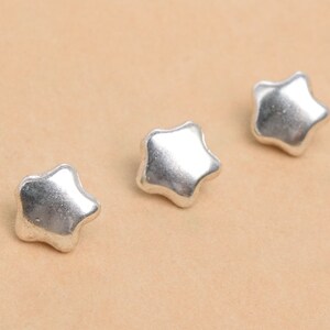 10 Pcs - 10x10MM Antique Silver Tone Star Spacer Beads (63631-2408)