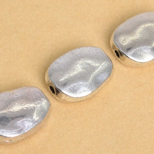 10 Pcs - 11x9MM Antique Silver Tone Oval Spacer Beads (63573-2406)